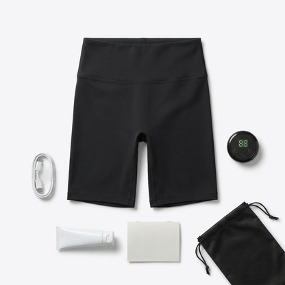 Lieferumfang von oben: Shorts, Steuergerät, Ladekabel, Gel-Tube, Anleitung und Aufbewahrungsbeutel